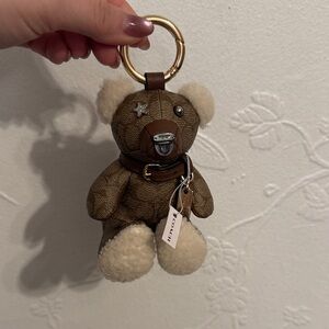 Retired coach Teddy Bear bag charm
